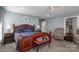 Comfortable bedroom with a large bed and an adjacent seating area at 108 N Oakwood Dr, Kings Mountain, NC 28086