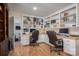 Spacious home office featuring built-in shelving and dual desk areas at 108 N Oakwood Dr, Kings Mountain, NC 28086