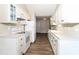 Well-lit kitchen with white cabinetry, ample counter space, and modern appliances at 136 Ole Eastpointe Dr, York, SC 29745