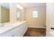 Bright bathroom features double vanity, modern finishes, and wood-look flooring at 1429 Edgewood Dr, Rock Hill, SC 29730