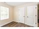 Neutral bedroom with wood-look floors and bright window at 1429 Edgewood Dr, Rock Hill, SC 29730