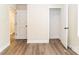 Bedroom with wood-look floors, white trim, and closet at 1429 Edgewood Dr, Rock Hill, SC 29730