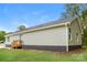 Exterior view of home with dark colored foundation and wooden deck at 1429 Edgewood Dr, Rock Hill, SC 29730