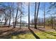 Backyard with view of the lake and private boat dock at 147 Pearl Bay Dr, New London, NC 28127