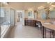 Spacious bathroom includes a tub, tiled shower, vanity and sink with granite countertop at 147 Pearl Bay Dr, New London, NC 28127
