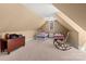 Charming bonus room with two beds, a ceiling fan, and a cozy rocking chair, perfect for guests or  at 147 Pearl Bay Dr, New London, NC 28127