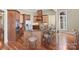 Well-lit kitchen showcasing custom wood cabinetry, granite countertops, and modern appliances at 147 Pearl Bay Dr, New London, NC 28127