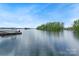 Waterfront dock and boat offer endless recreational opportunities at 147 Pearl Bay Dr, New London, NC 28127