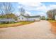 Large, level backyard providing ample space and featuring a detached garage at 155 Country Ln, Mooresville, NC 28115