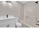 Modern bathroom featuring a shower and vanity with bright white countertops and fixtures at 155 Country Ln, Mooresville, NC 28115