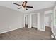 Bedroom features hardwood floors, new paint, closet and bathroom doorway at 155 Country Ln, Mooresville, NC 28115