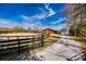 Horse property with an outdoor arena and a well-maintained red barn at 1790 Faires Rd, Rock Hill, SC 29730