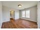 Bedroom featuring hardwood floors and large window at 1790 Faires Rd, Rock Hill, SC 29730