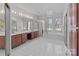 Bathroom with double vanity, bathtub, and chandelier at 2430 Berkshire Dr, Salisbury, NC 28146