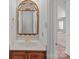 Powder room with gold faucet and mirror at 2430 Berkshire Dr, Salisbury, NC 28146