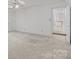 Neutral bedroom featuring an open door to the hallway at 2430 Berkshire Dr, Salisbury, NC 28146