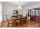 Elegant dining room with wood floors, chandelier, and ample seating at 2430 Berkshire Dr, Salisbury, NC 28146