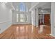 Open living room with hardwood floors, white columns, and lots of natural light at 2430 Berkshire Dr, Salisbury, NC 28146