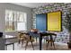 Dining room with wooden table, chairs, modern art, and a view of the outside at 3012 Hutton Gardens Ln, Charlotte, NC 28269