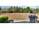 Large backyard featuring well-maintained lawn, a grill, and greenery perfect for outdoor entertaining at 3034 Oakmere Rd, Waxhaw, NC 28173