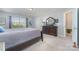 Comfortable bedroom with a large bed, dresser, and bright natural light at 3034 Oakmere Rd, Waxhaw, NC 28173