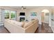 Cozy living room with fireplace, plush seating, and a window that brightens the space at 3034 Oakmere Rd, Waxhaw, NC 28173