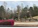 Colorful community playground with various play structures and a safe, padded surface at 3034 Oakmere Rd, Waxhaw, NC 28173