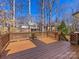 Large deck overlooking the serene backyard, providing ample space for outdoor furniture and entertaining at 3222 Shadow Lake Ln, Matthews, NC 28104