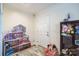 This light and bright entryway showcases a dollhouse, a stuffed Minnie Mouse, and light wood-look vinyl plank flooring at 340 W Memorial Hwy, Harmony, NC 28634