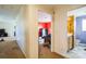 Hallway leading to a bedroom and bathroom, with views of other rooms in the home at 340 W Memorial Hwy, Harmony, NC 28634