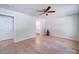 Spacious bedroom with wood-look floors and an ensuite bathroom for added comfort and privacy at 406 White Store Rd, Wadesboro, NC 28170