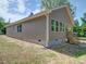 Side exterior view of home showing the covered porch and window placements at 406 White Store Rd, Wadesboro, NC 28170