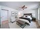 A serene main bedroom featuring wood-look floors and a stylish ensuite bathroom at 406 White Store Rd, Wadesboro, NC 28170