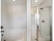 Modern bathroom featuring a separate tub and glass-enclosed shower at 4127 Stacy Blvd, Charlotte, NC 28209