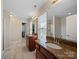 Bathroom featuring double sinks with granite countertops and lots of natural light at 4127 Stacy Blvd, Charlotte, NC 28209