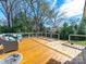 Inviting outdoor deck featuring a seating area, nice railings and view of the backyard at 4127 Stacy Blvd, Charlotte, NC 28209