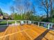 Inviting outdoor deck featuring a seating area, nice railings and view of the backyard at 4127 Stacy Blvd, Charlotte, NC 28209