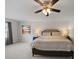 Large main bedroom suite with soft carpet, ample light, ceiling fan, and space for large furniture at 4127 Stacy Blvd, Charlotte, NC 28209