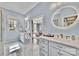 Elegant bathroom with dual vanities, marble countertops, and modern fixtures at 4536 Rustling Woods Dr, Denver, NC 28037