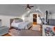 Cozy bedroom features a comfortable bed, soft lighting, and neutral gray tones at 4536 Rustling Woods Dr, Denver, NC 28037