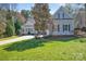 Charming traditional-style home with an inviting entryway and a well-manicured front yard at 4536 Rustling Woods Dr, Denver, NC 28037