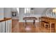 Upstairs game room features a foosball table, piano, and hardwood floors at 4536 Rustling Woods Dr, Denver, NC 28037