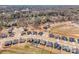 This aerial view shows a neighborhood with new construction homes and tree lines at 456 Lucky Dr, Concord, NC 28027