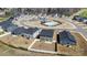 Aerial view of the neighborhood featuring a community pool, clubhouse and tree lined streets at 5013 Dunsford Dr, Denver, NC 28037