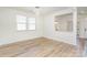 Bright dining room featuring wood floors, large windows, and an open-concept design at 5013 Dunsford Dr, Denver, NC 28037