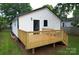 View of a wooden deck with stairs in a fenced backyard at 621 Cauthen St, Rock Hill, SC 29730