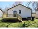 Home showcasing a newly constructed deck with stairs leading to a lawn at 621 Cauthen St, Rock Hill, SC 29730