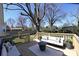 Backyard view from the outdoor deck featuring a seating area and a beautiful lawn at 621 Cauthen St, Rock Hill, SC 29730