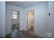 Bright hallway features wood-look floors, with doorways leading to a bedroom and bathroom at 621 Cauthen St, Rock Hill, SC 29730