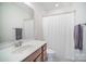 Bathroom featuring a white vanity, toilet and shower with a white curtain at 758 Waterscape Ct, Rock Hill, SC 29730